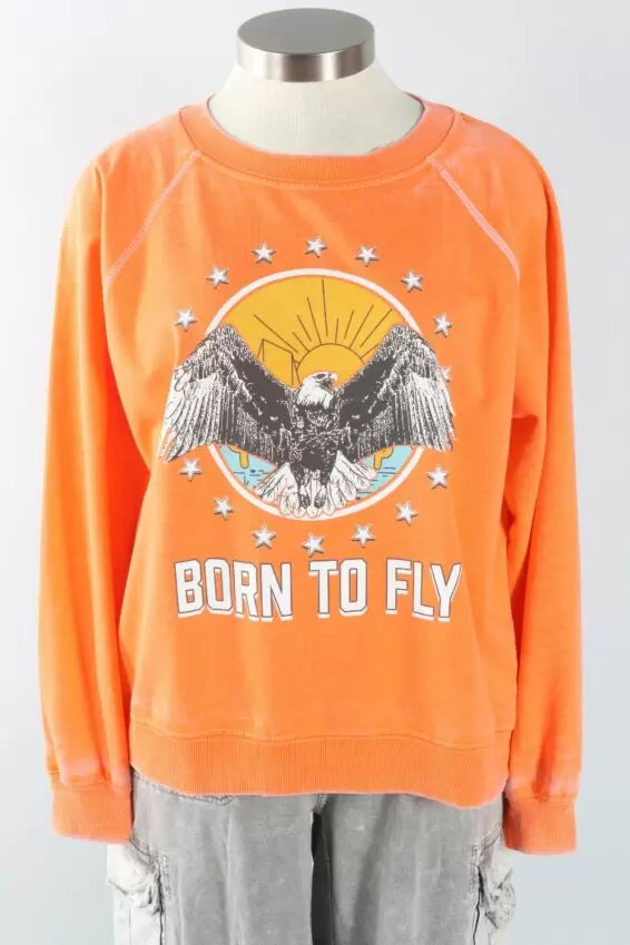 Tangerine oversized sweatshirt with eagle mountain graphic and 'BORN TO FLY' text