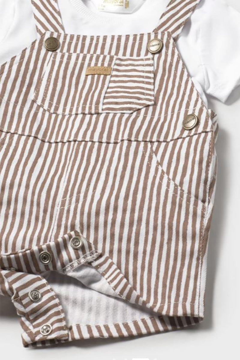 Close-up: brown striped romper overalls with metal buttons and snap cuffs