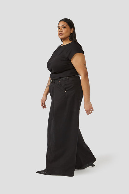 Black wide-leg trousers with button waistband and wide legs, front pleats