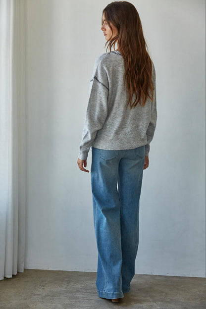 Heather grey crewneck sweater, knit trim on shoulders and sleeves, ribbed cuffs