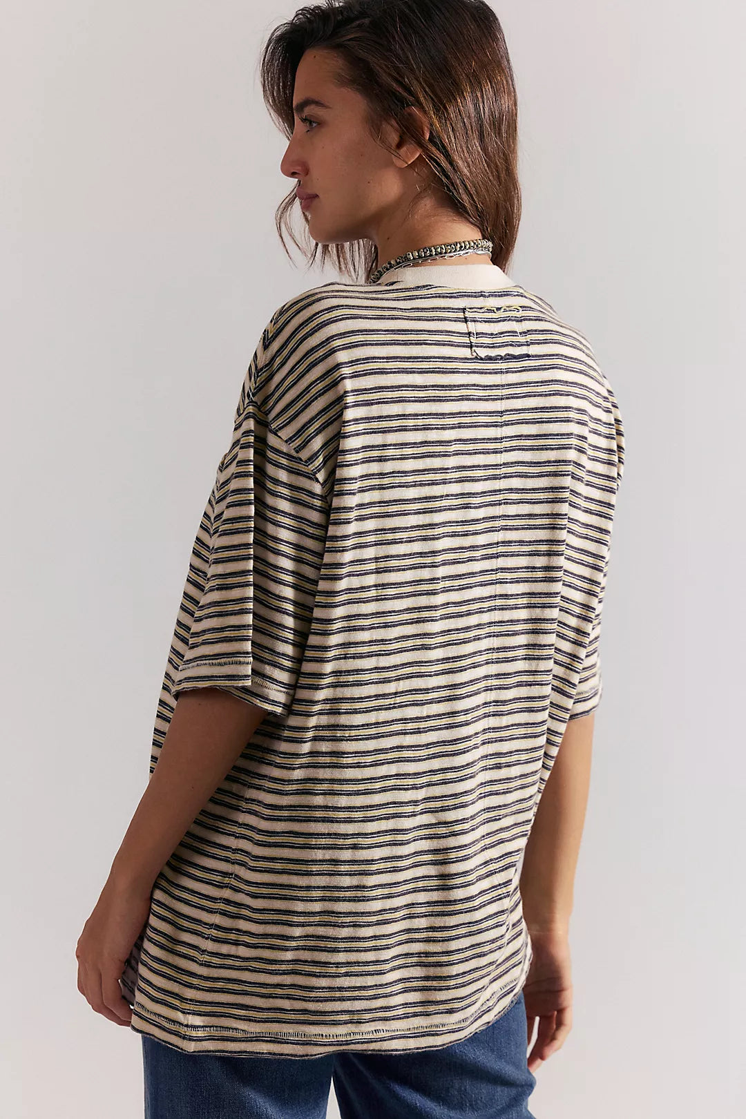 Striped pocket tee with three-quarter sleeves and scoop neckline