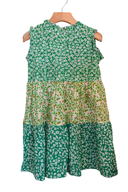 Green floral sleeveless dress with gathered yoke and tiered skirt tiers