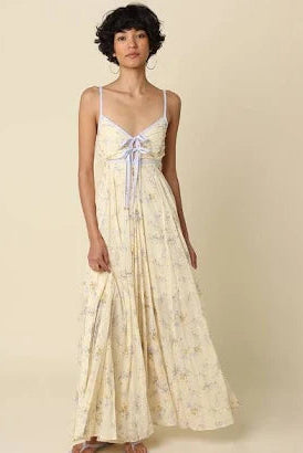 Floral maxi dress with spaghetti straps, bow-tie bodice, tiered skirt