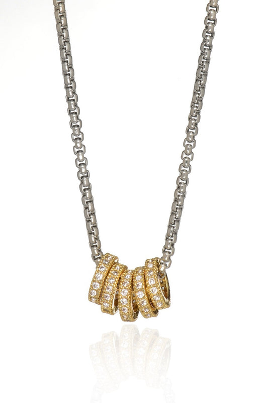 Silver chain necklace with gold scalloped crystal-like pendant centerpiece