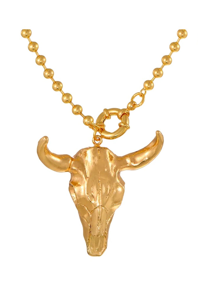 Gold beaded necklace with bull skull pendant and heart clasp