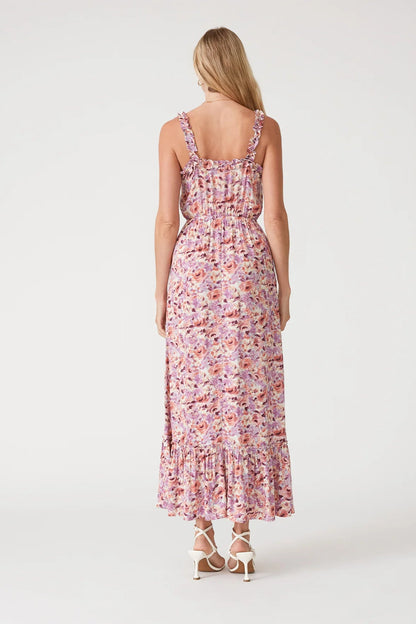 Back view: floral ruffle-strap maxi dress with smocked waist and tiered hem