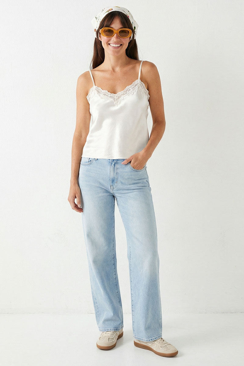 Off-white satin lace-trim cami with thin straps and sweetheart neckline.