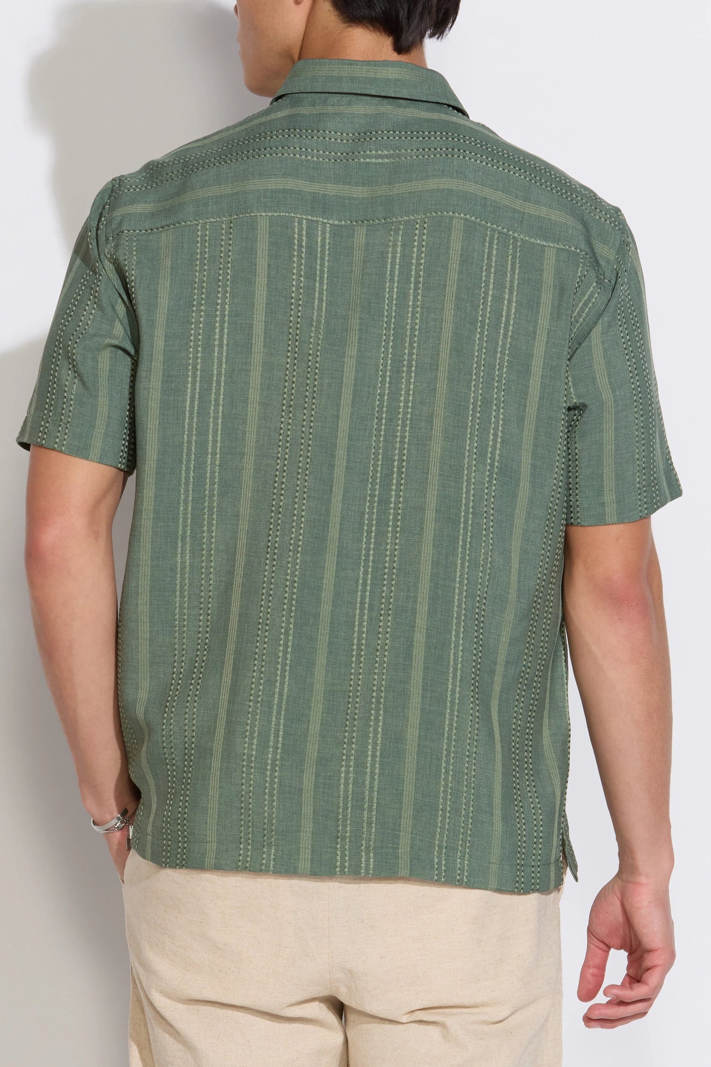 Bataraza short sleeve woven shirt in hunter green back view