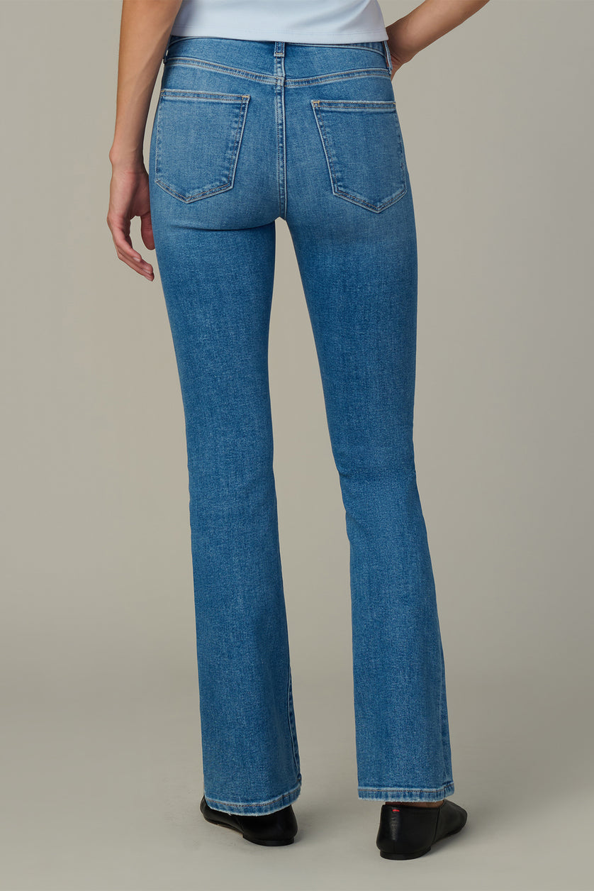 Light blue bootcut jeans with two hip pockets and button-zip fly detail