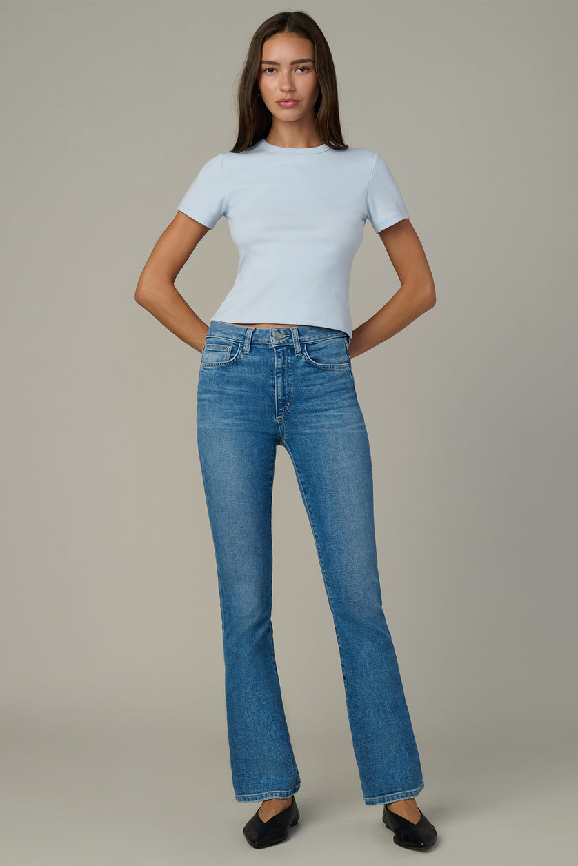 Light blue bootcut jeans with high rise and five-pocket styling