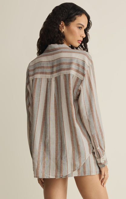 Striped button-up shirt, back view with vertical stripes and long sleeves in light beige