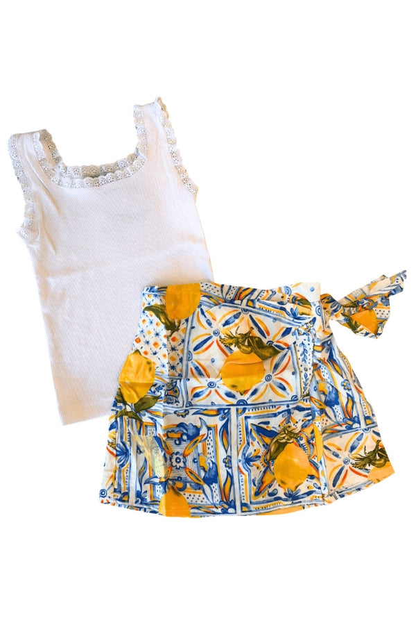 Lemon print skort with waist tie and tiered ruffled skirt, blue and white pattern.