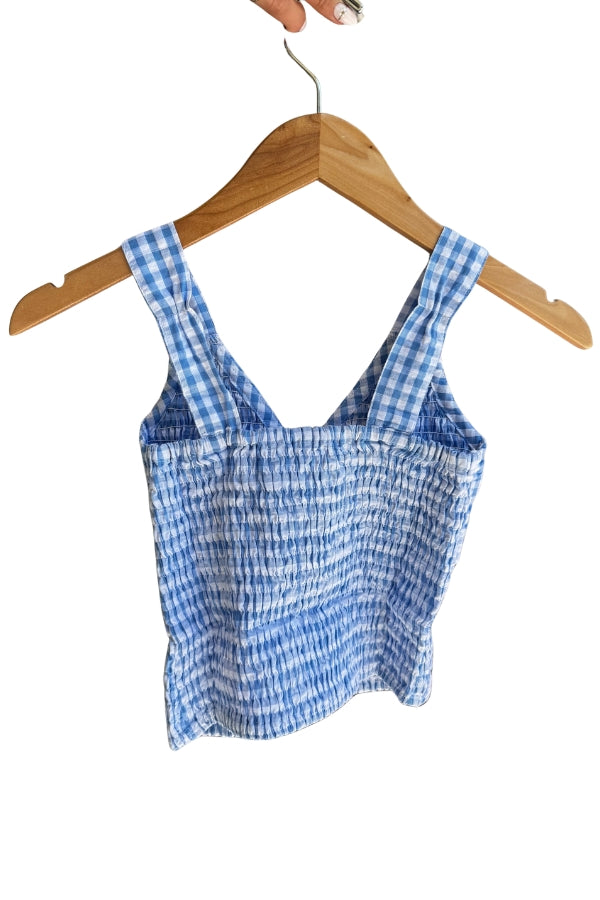 Blue gingham tie smock top with sleeveless straps and elastic smocked bodice