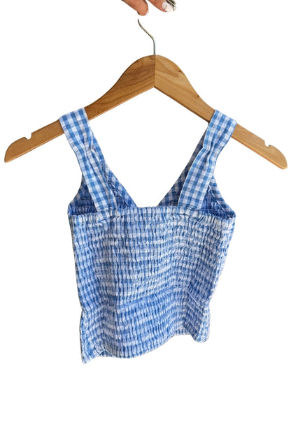 Blue gingham tie smock top with sleeveless straps and elastic smocked bodice
