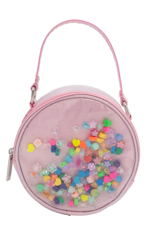 Shake confetti round bag in pink