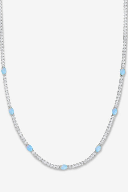 Silver and blue necklace on white backdrop