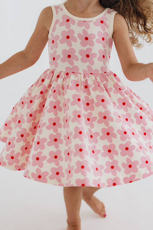 Pink floral twirl dress with sleeveless tank bodice and gathered, twirly skirt