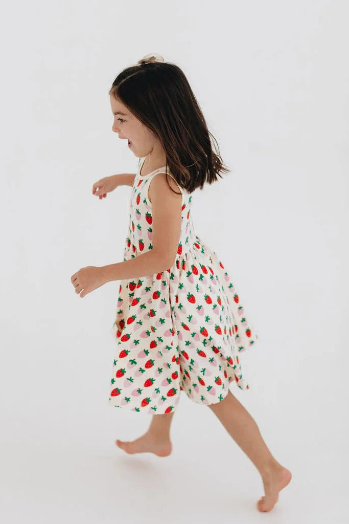 Strawberry and cactus twirl dress with sleeveless bodice and twirly gathered skirt