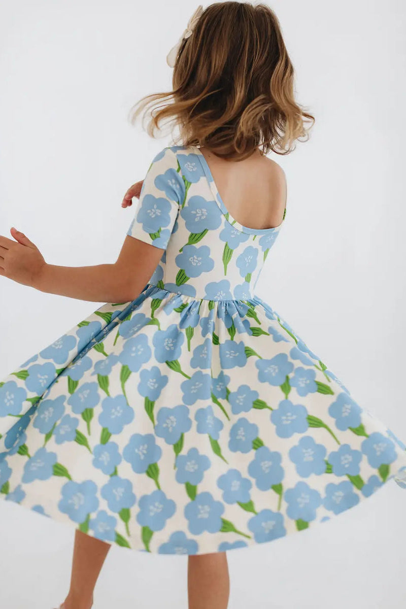 Girls twirl dress in light blue floral print, scoop back, gathered waist flare.