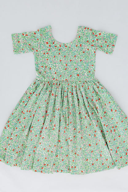 Girls green floral twirl dress, front view, off-shoulder square neckline