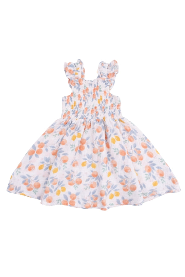 Smocked sundress with orange and blue floral print, ruffled shoulder straps.