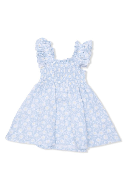 Smocked sundress with light blue daisy print, flutter sleeves and elastic waist.