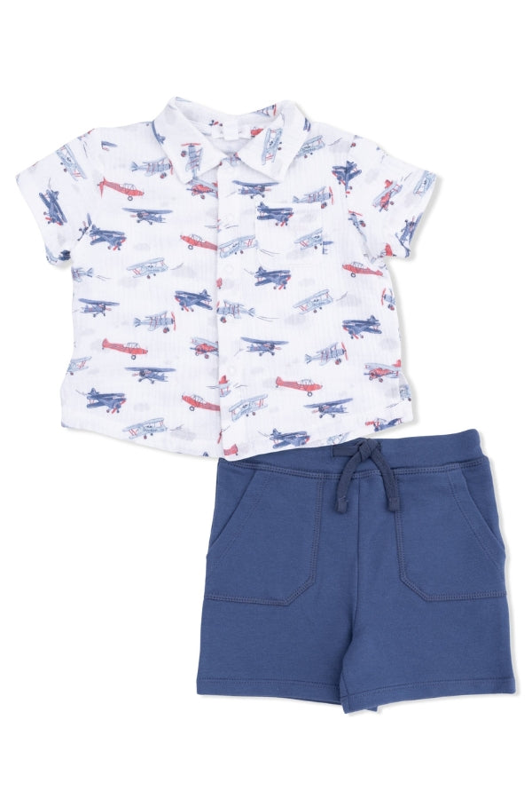 Plane-print white short-sleeve button-up with navy drawstring shorts
