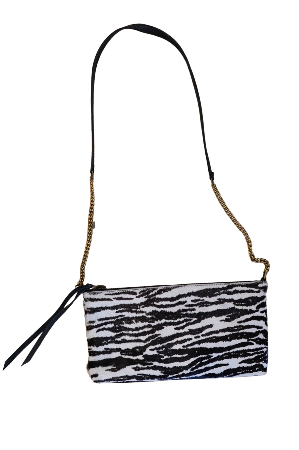 Zebra print handbag with a chain strap on a white background