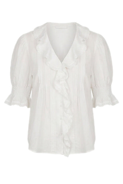 White blouse with ruffled sleeves on a white background