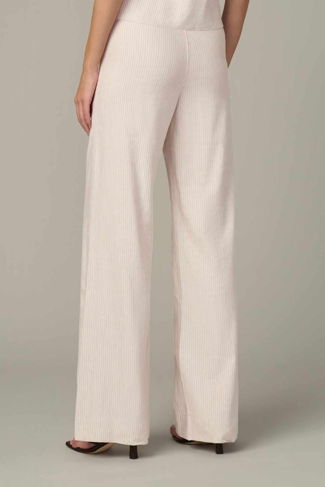 Cream micro-stripe wide-leg trousers with back seam and long straight legs