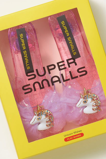 Pair of pink translucent unicorn play shoes in packaging, sparkly tulle bows