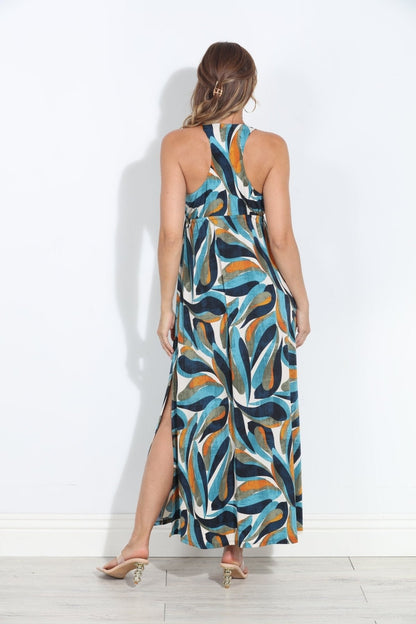 Back view of racerback maxi dress with abstract swirl print and open-back strap detail