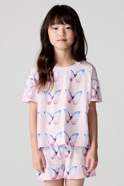 Girls' pink butterfly print tee with blue and pink fluttering butterflies
