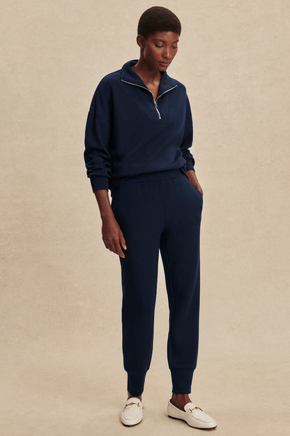 Navy tapered cuff pants with elastic hem cuffs