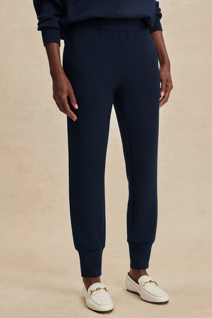 Navy tapered cuff pants, ankle-length with front seam