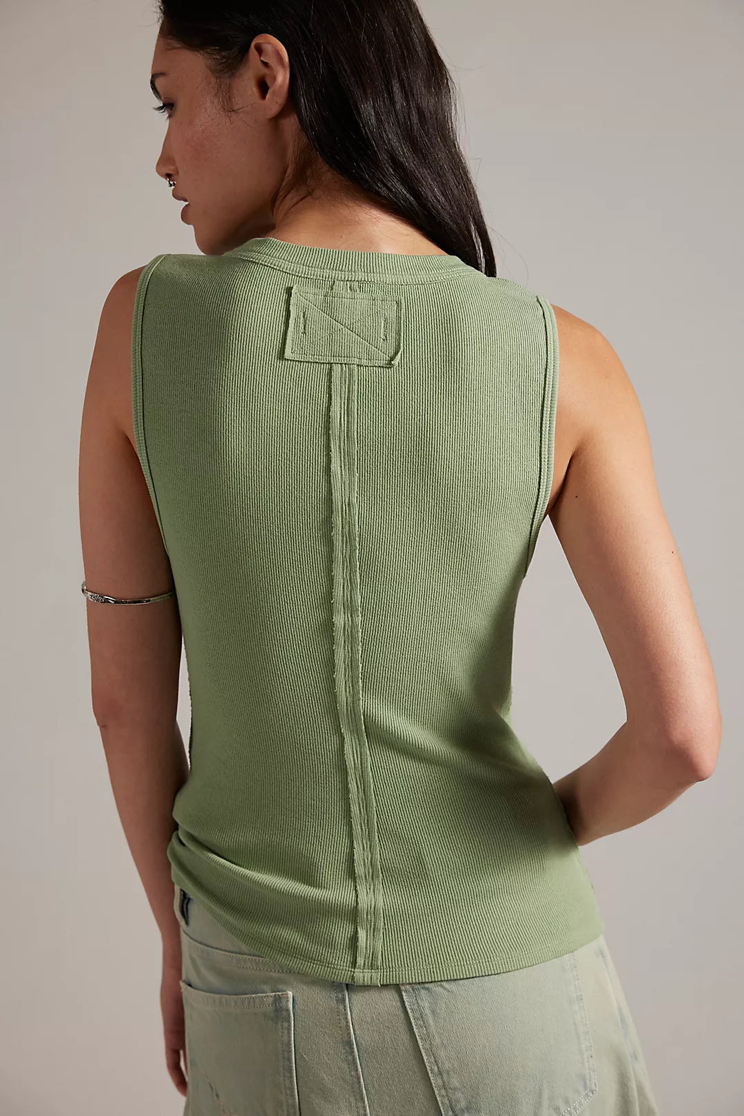 Green tank top with square back yoke and vertical stitching