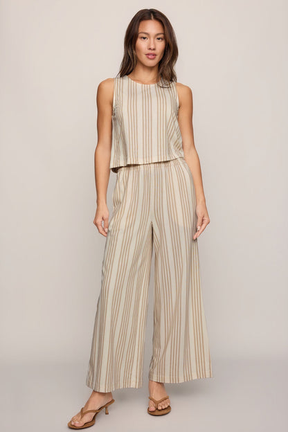 Striped knit sleeveless top with crew neck, light beige base and tan vertical stripes