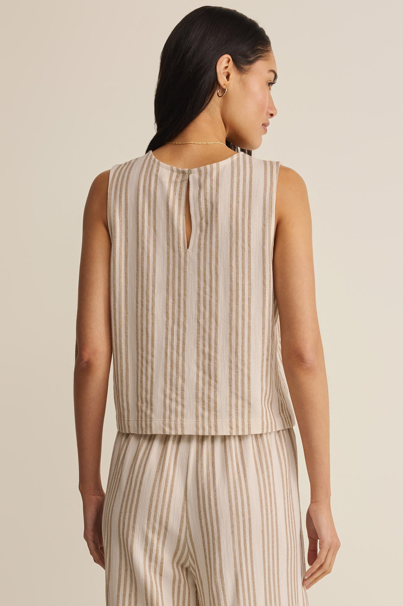 Striped knit sleeveless top, keyhole back with vertical tan stripes on light beige