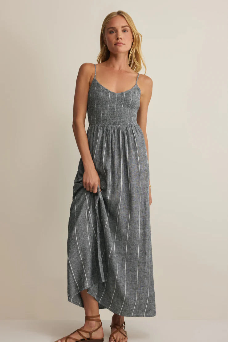 Dark gray striped maxi dress with spaghetti straps and gathered waist, full length