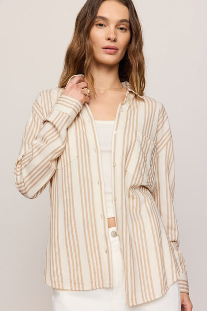 Striped button-up shirt with collar, long sleeves, and button front