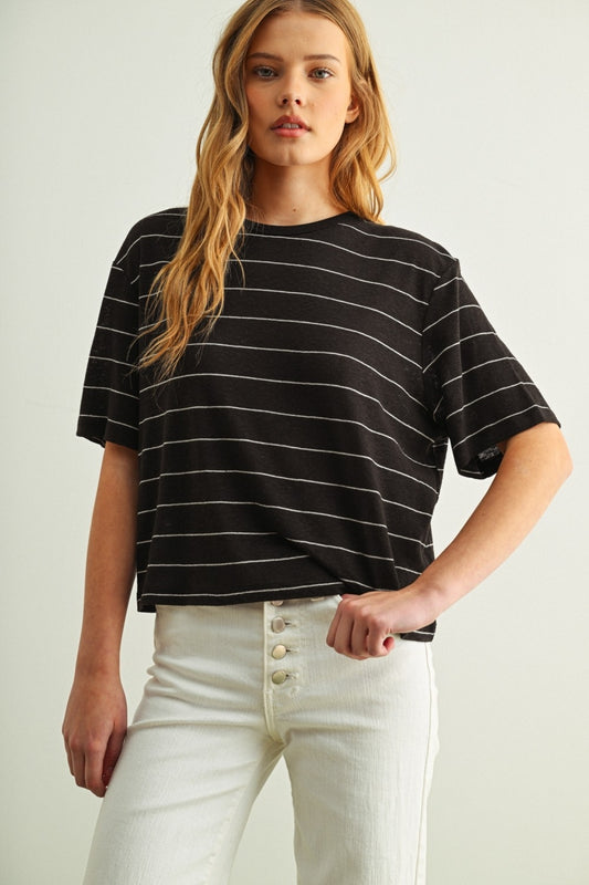 Black and white striped linen top with short sleeves and crew neck.