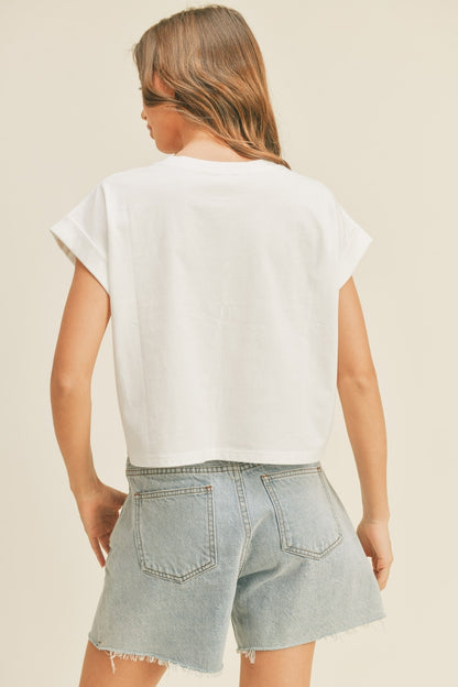 Off-white round neck cuff sleeve top, short back view with curved hem