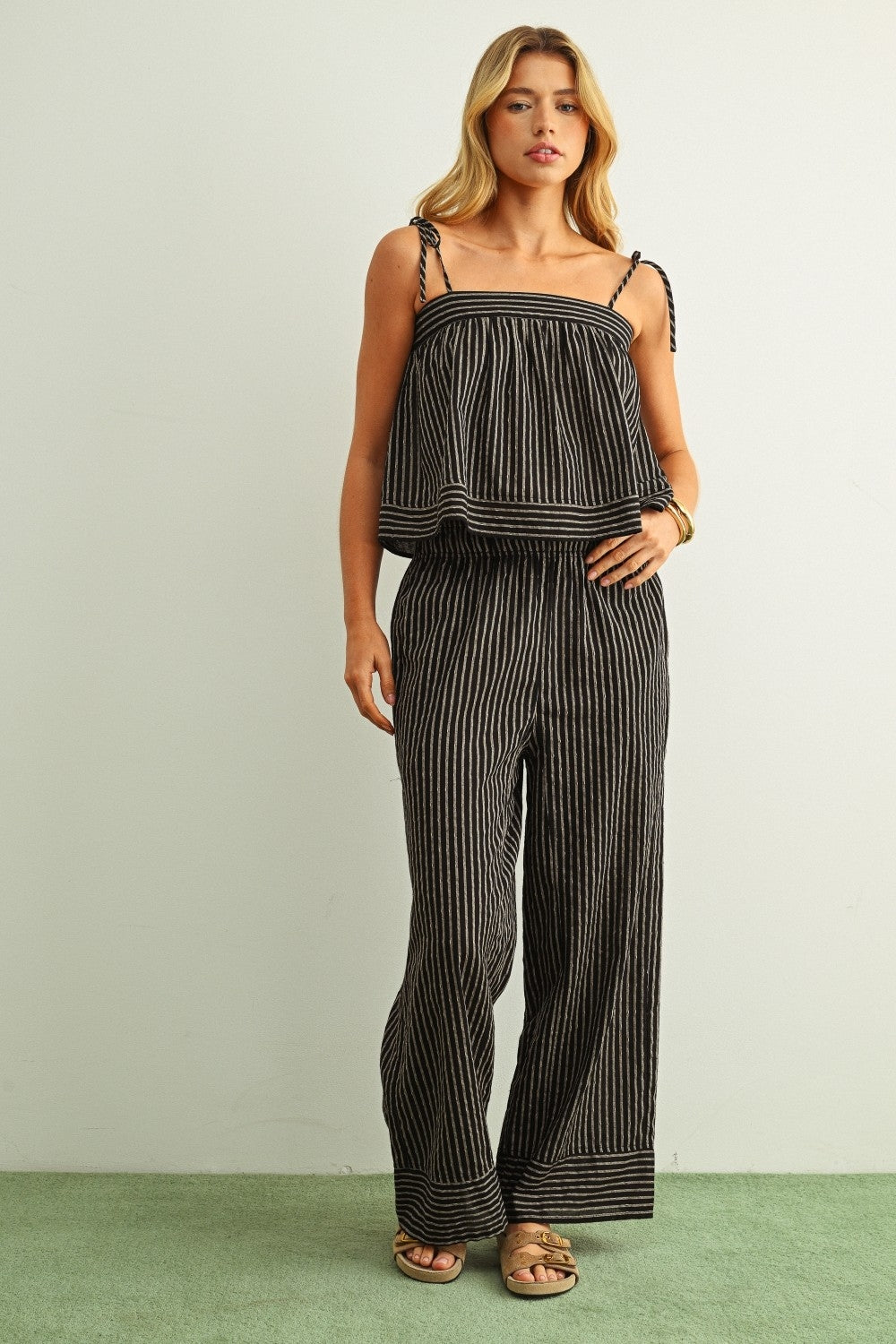 Dark striped print tank top with smocked bandeau and spaghetti straps, straight hem