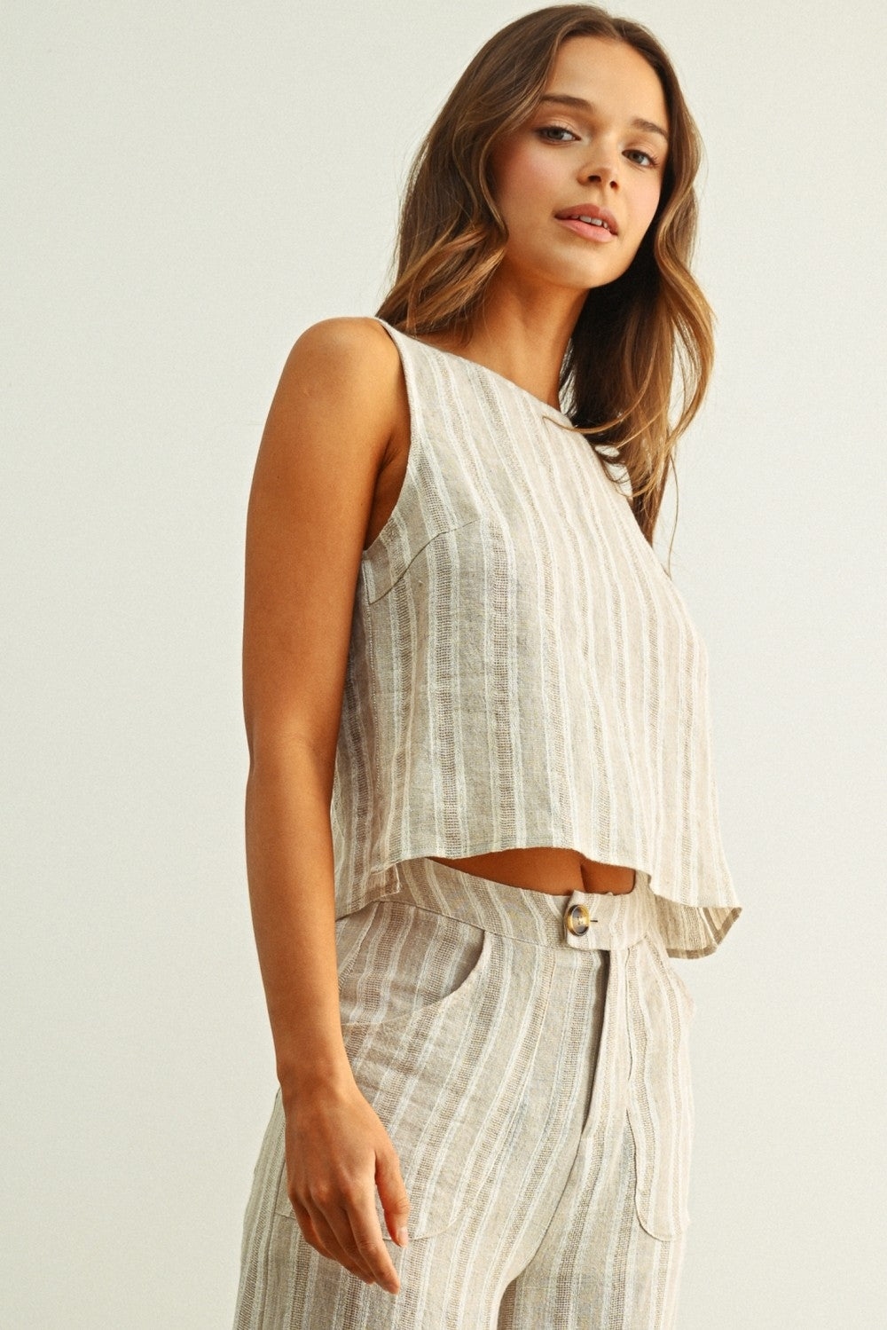 Linen jacquard twist-back top, sleeveless with curved ruffle hem, white/stone stripes