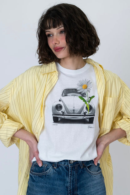 White graphic T-shirt with car and daisy front print