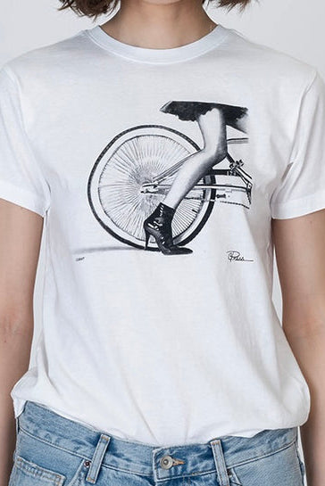 Worn white graphic t-shirt with cyclist riding over bicycle wheel print