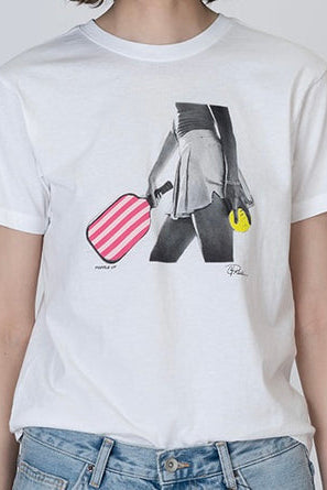 White T-shirt with black-and-gray graphic, red striped heart, and small yellow mark