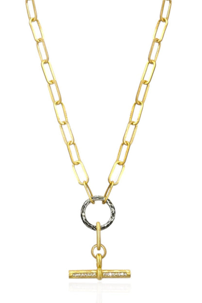 Gold toggle necklace with oval link chain, circular ring, and bar pendant
