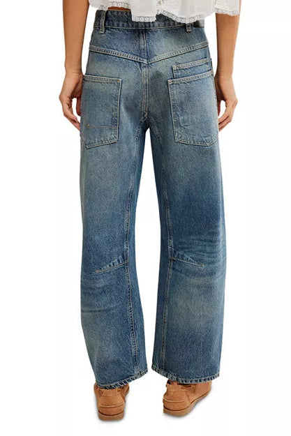 Light blue boyfriend jeans with stitched patch pockets and relaxed wide-leg cut