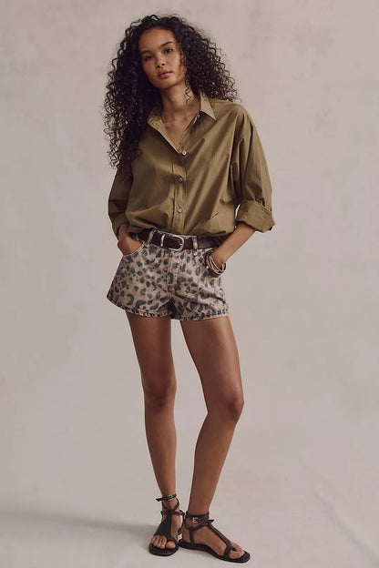 Leopard print denim shorts with button fly and belt loops